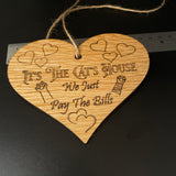 It's the cats house......laser engraved wooden heart